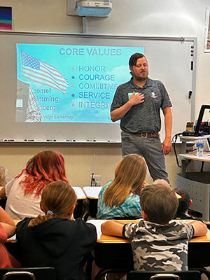 Wounded warrior and U.S. Marine veteran Nick Morrison talks to students at Southridge Elementary School in Casper, Wyoming, as part of WWP's Honor Their Courage program.